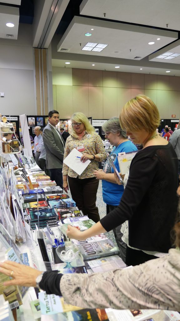 People at table tradeshow